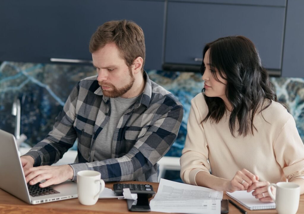 A couple creates a budget to manage their finances better