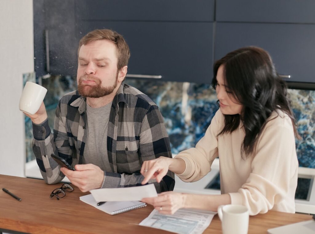 A couple planning their budget for a financially secure future