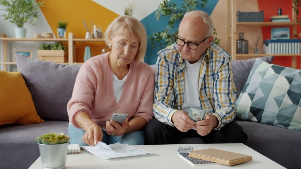 A couple reviewing their retirement savings plan