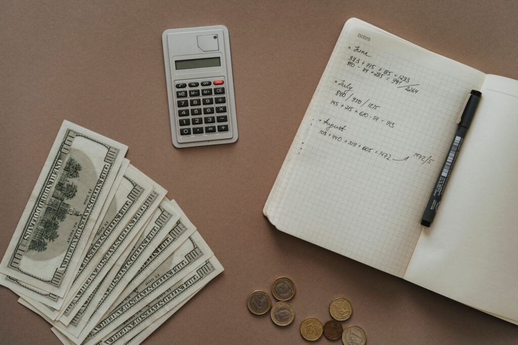 A person using budgeting tools to manage their sinking funds