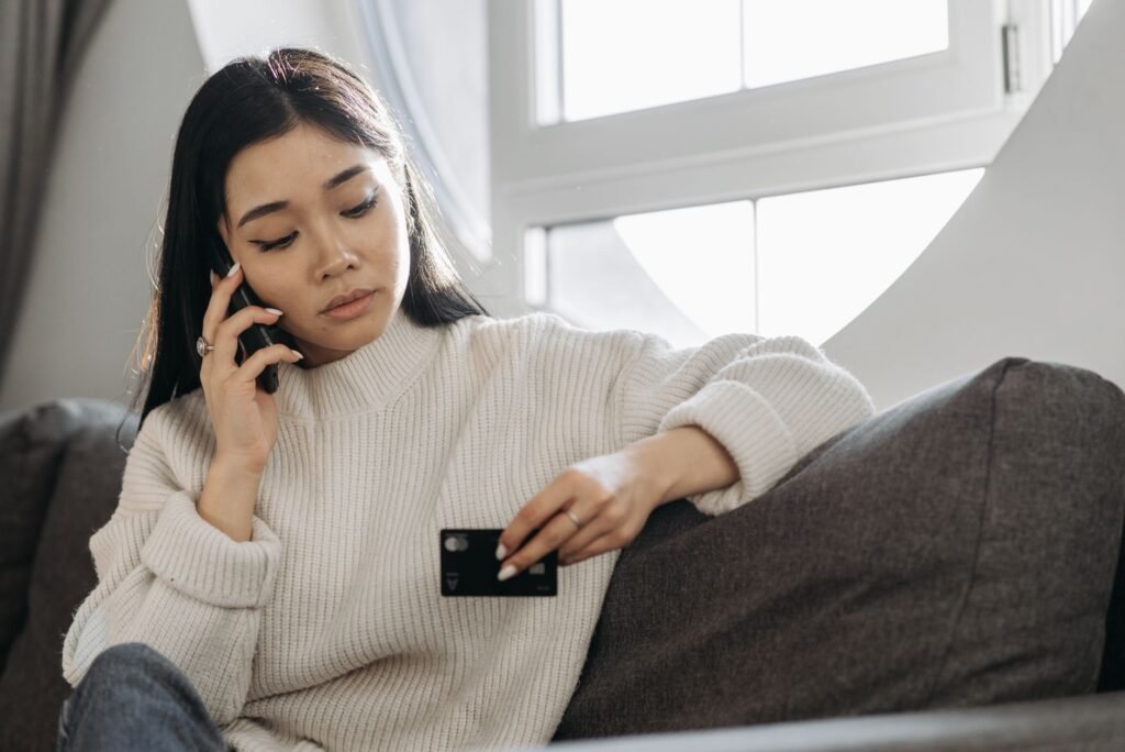 A young person reviewing their credit score online to understand their financial standing
