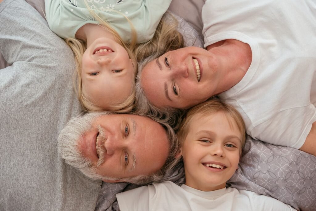 A smiling family relaxing together at home