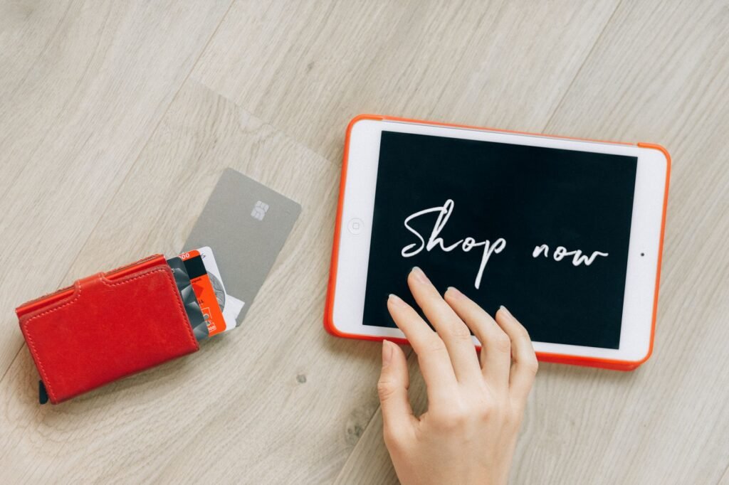 Close-up of a digital shopping theme with a tablet and credit cards