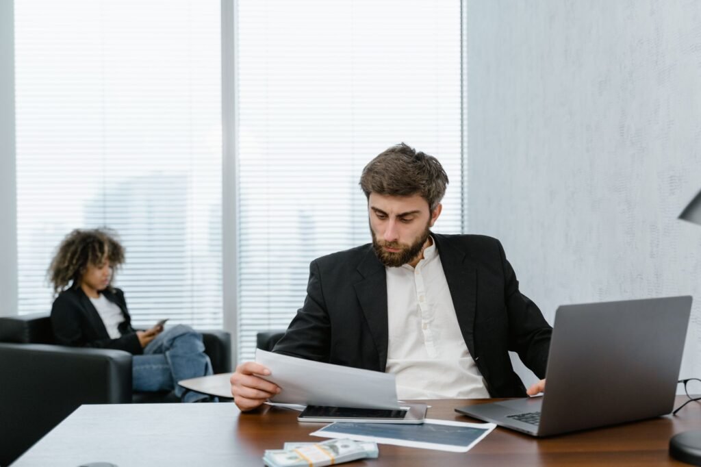 A person reviewing their credit report to understand their score