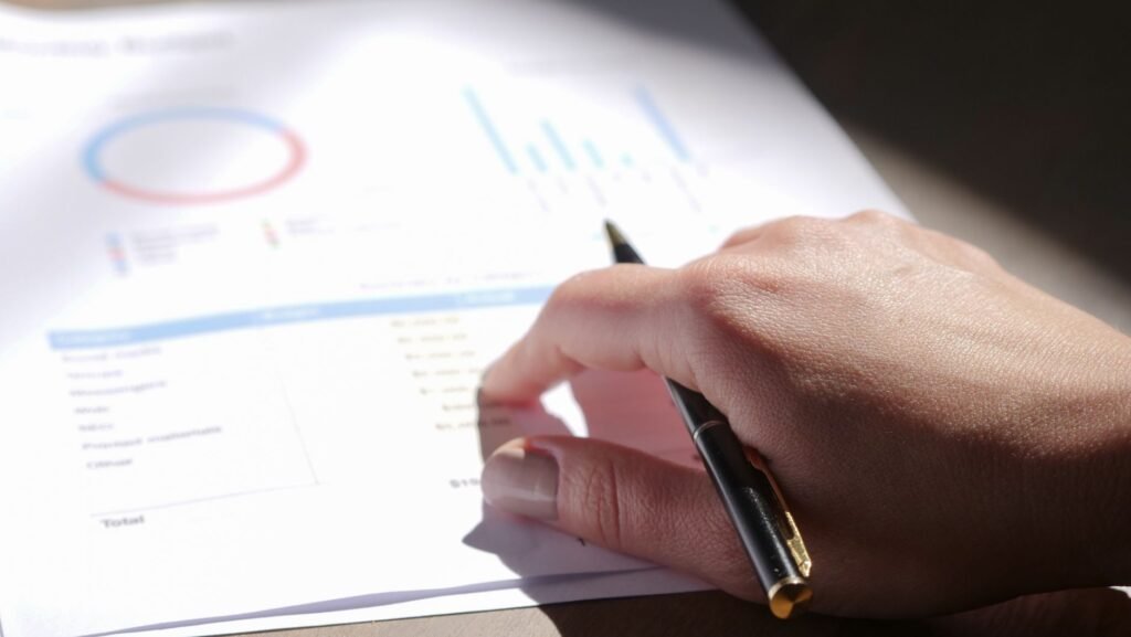 An individual analyzing their credit report for errors and updates